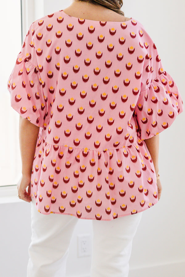 Chic Soul plus size clothing, pink short sleeve baby doll blouse with button up detail down the front with v neckline with bubble sleeves with abstract yellow/fuchsia print