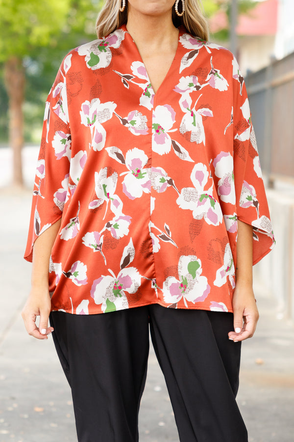 Chic Soul plus size clothing, orange floral pattern flowy top with a v neck and flowy sleeves