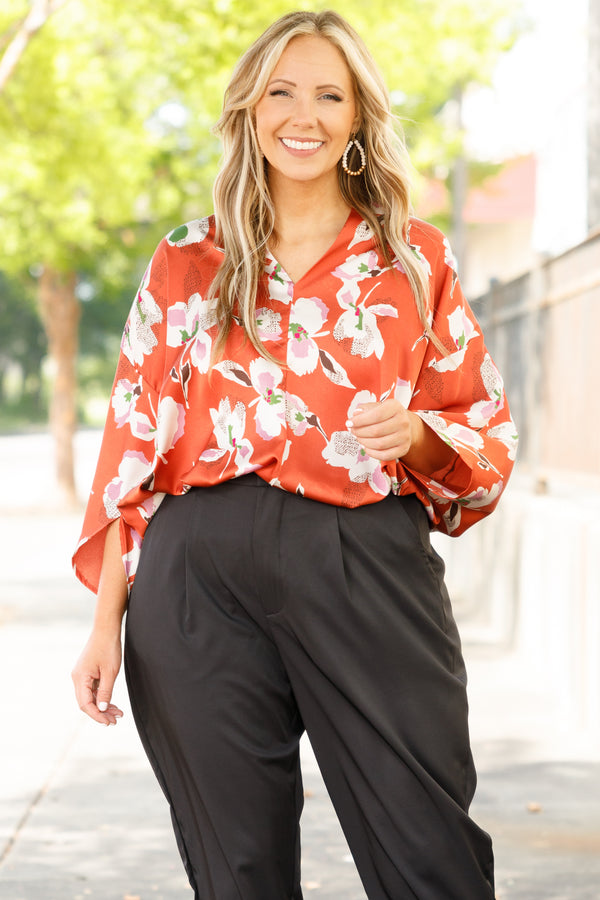 Chic Soul plus size clothing, orange floral pattern flowy top with a v neck and flowy sleeves