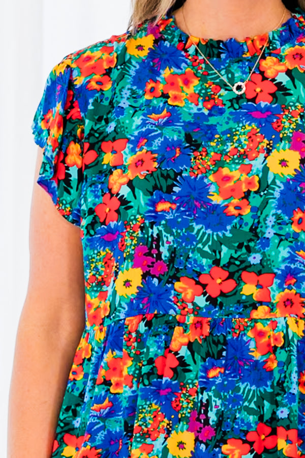 Chic Soul plus size clothing, multicolor floral pattern top with a cinched waistline and flutter sleeves
