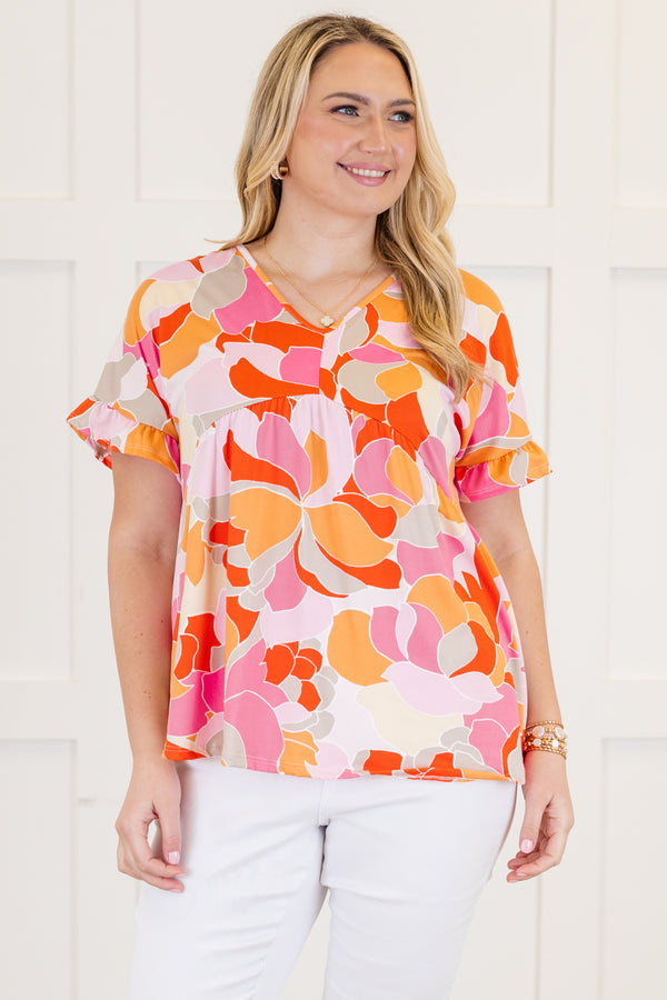 Chic Soul plus size clothing, Basic purple short sleeve babydoll top, with a multi-color abstract pattern, a ruffle accent at the end of the sleeves and a slight v-neck 
