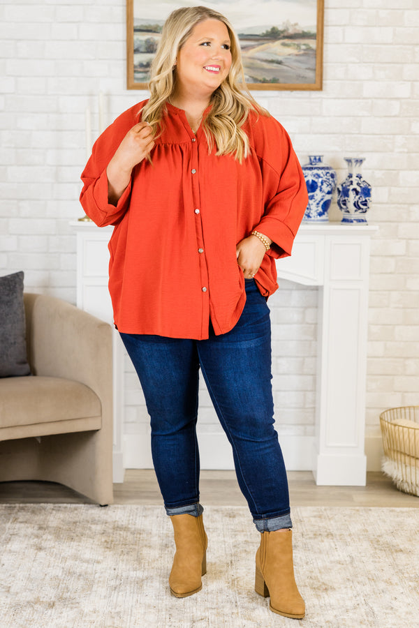 Plus Size orange airflow fabric top with silver buttons, a mandarin collar, and 3/4 sleeves.