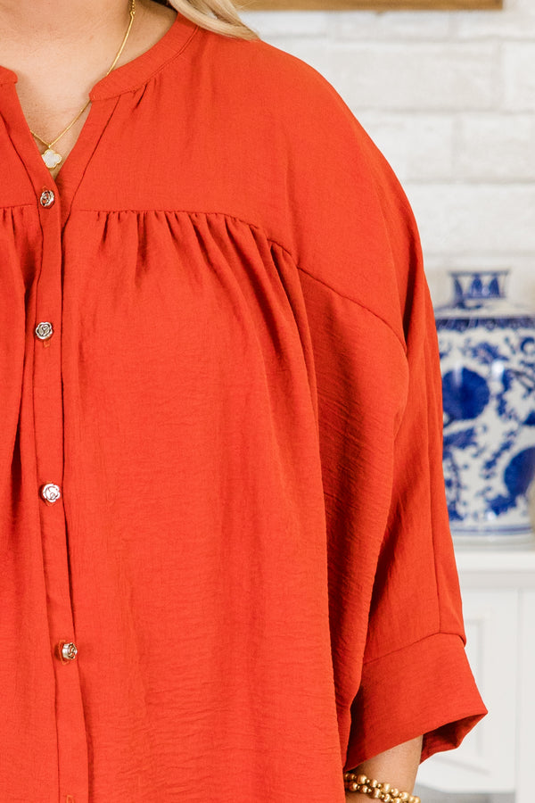 Plus Size orange airflow fabric top with silver buttons, a mandarin collar, and 3/4 sleeves.