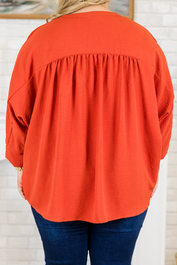 Plus Size orange airflow fabric top with silver buttons, a mandarin collar, and 3/4 sleeves.
