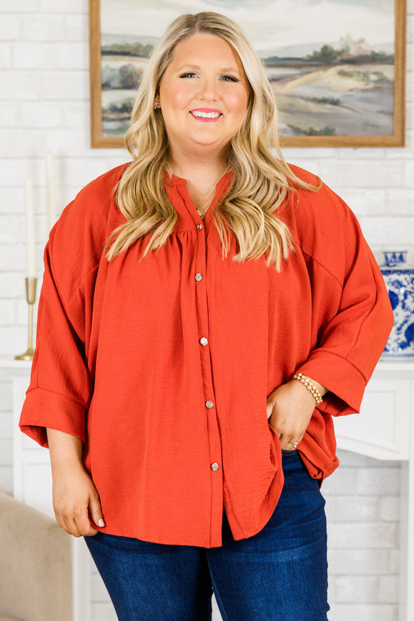 Plus Size orange airflow fabric top with silver buttons, a mandarin collar, and 3/4 sleeves.