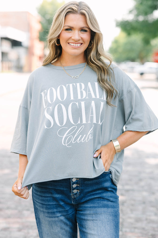 Plus Size steel blue vintage wash tee with Football Social Club graphic and unfinished hems.
