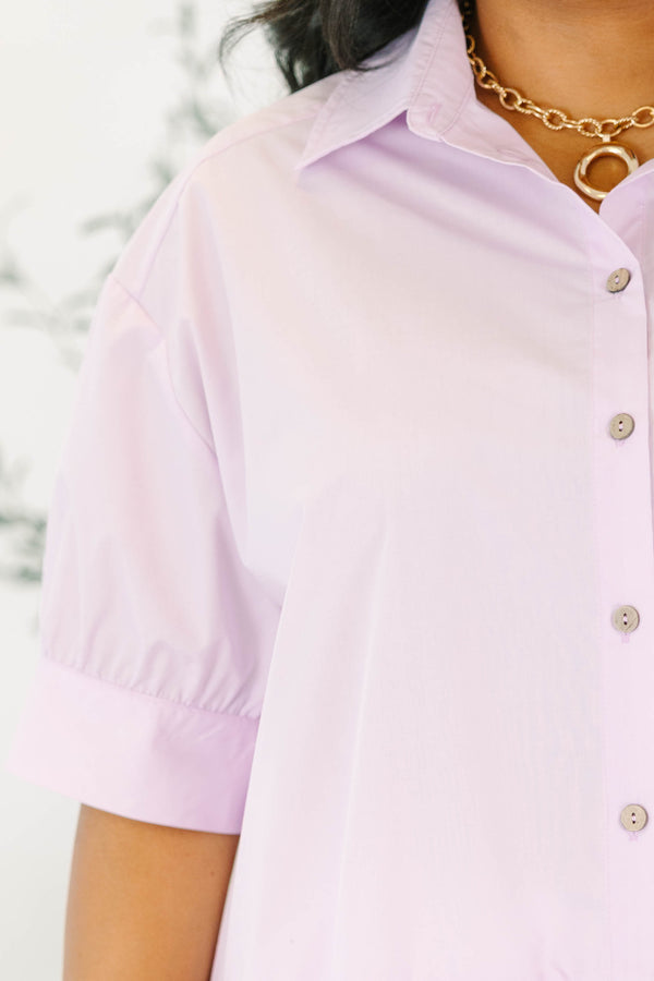 Plus Size lilac button-down top with short puff sleeves, a collar, and a ruffled peplum hem.