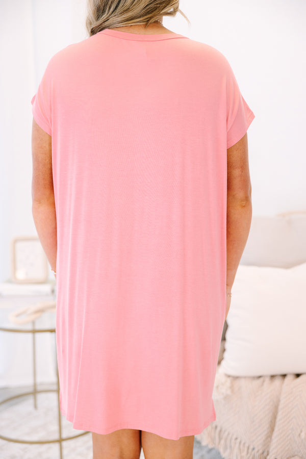Plus Size short sleeve crew neck mini dress in blossom pink with a front pocket.