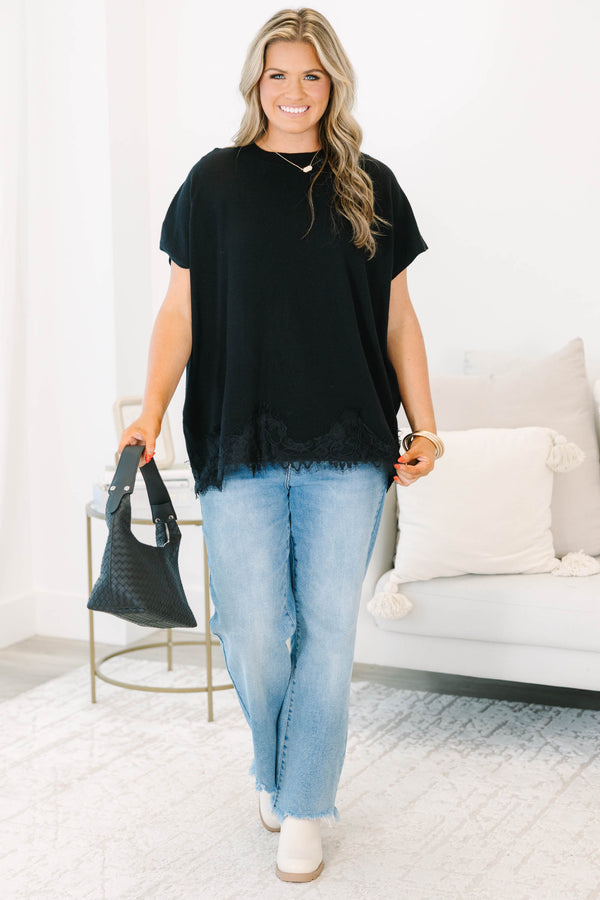 Plus Size black oversized sweater with short sleeves and a delicate lace hem detail.