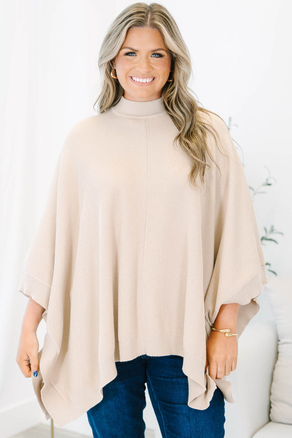 Plus Size taupe ribbed knit poncho with a mock neckline and wide, draped sleeves.