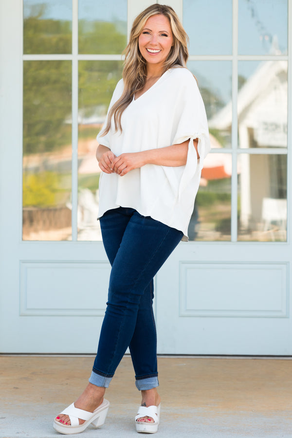 Chic Soul plus size clothing, cream flowy blouse with knotted sleeves detailing