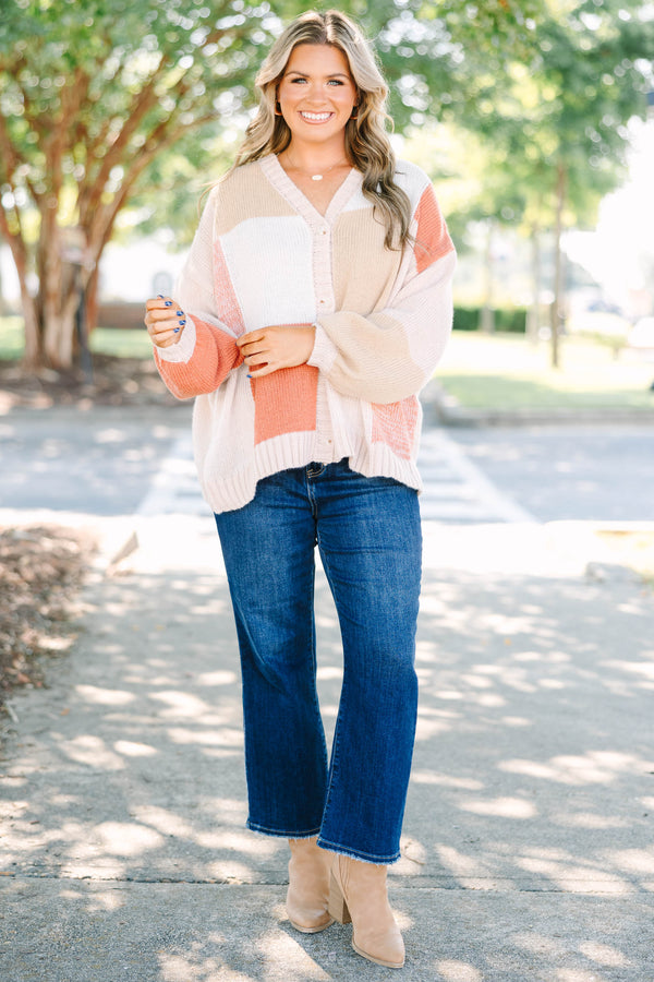 Plus size colorblock knit cardigan in multi-color peach, tan, and cream with a relaxed, flowy fit.