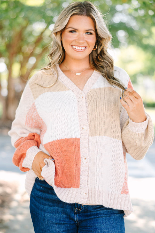 Plus size colorblock knit cardigan in multi-color peach, tan, and cream with a relaxed, flowy fit.
