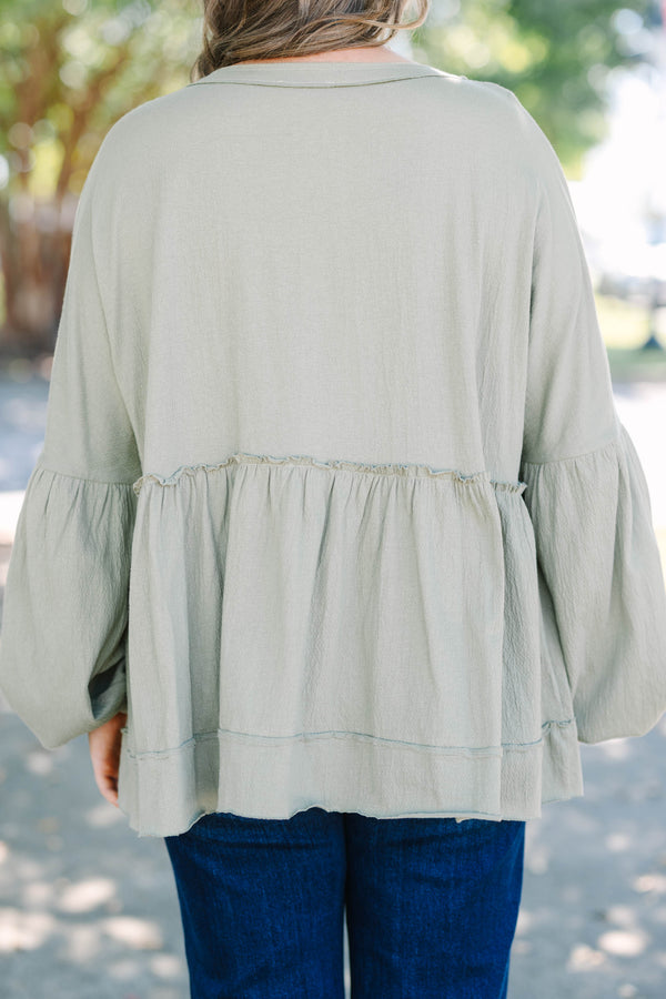 Chic Soul plus size clothing, olive green long sleeve baby doll top with buttons half way down 
