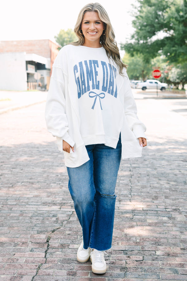 Plus Size ivory crew neck sweatshirt with blue 'GAME DAY' text and a bow graphic