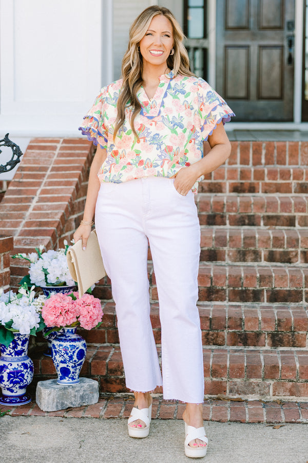 Chic Soul plus size clothing, blue floral multi print short sleeve top with v neckline and tiered ruffle sleeves with scalloped purple edges along sleeves and neckline