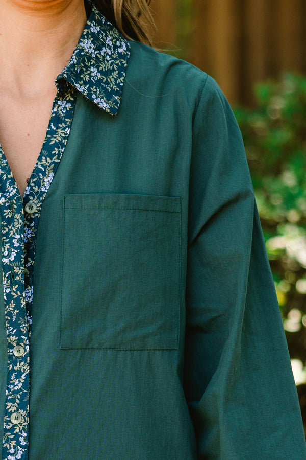 Chic Soul plus size clothing, dark green long sleeve button up top with floral pattern stripe vertically down the middle