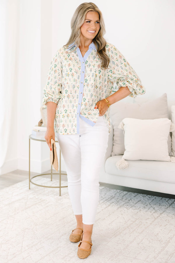 Chic Soul plus size clothing, cream colored long-puff sleeve collared button-up pocket top with leafy floral pattern and blue and white striped blocking around collar and buttons