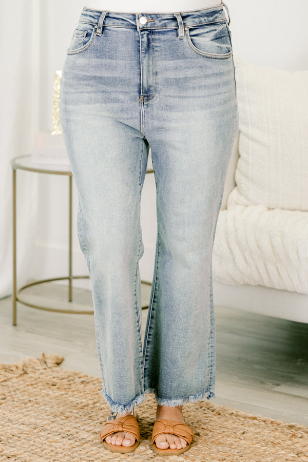   Chic soul plus size clothing, light wash blue jeans with frayed detail on both pant legs 
