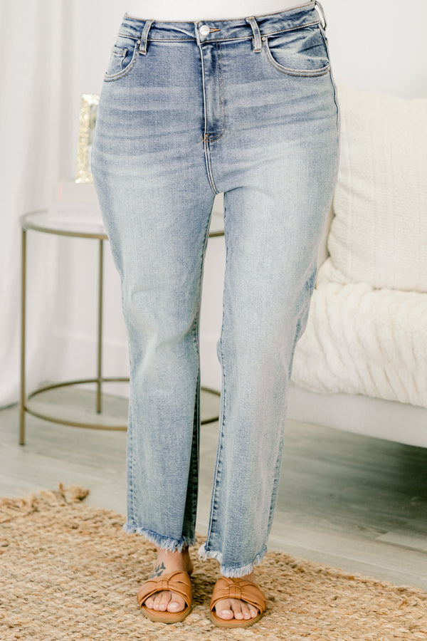   Chic soul plus size clothing, light wash blue jeans with frayed detail on both pant legs 
