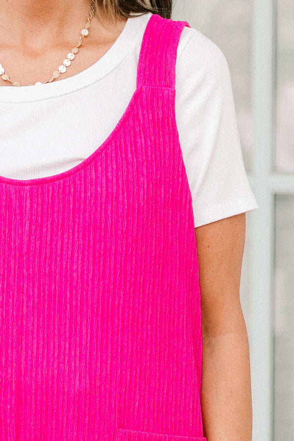 Chic Soul plus size clothing, fuchsia sleeveless jumpsuit with front pockets and a scooped neckline 

