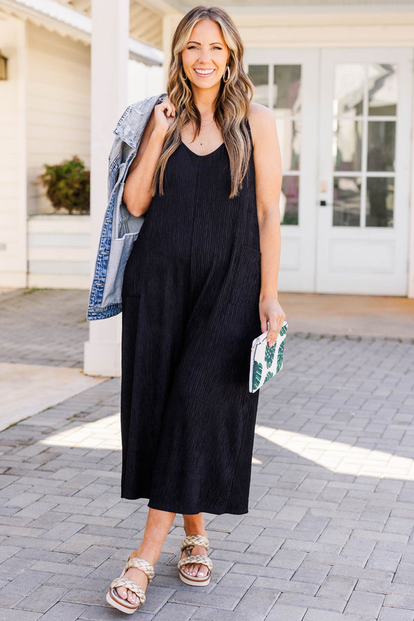 Chic Soul plus size clothing, black jumpsuit with front pockets and scoop neckline