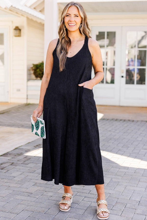 Chic Soul plus size clothing, black jumpsuit with front pockets and scoop neckline