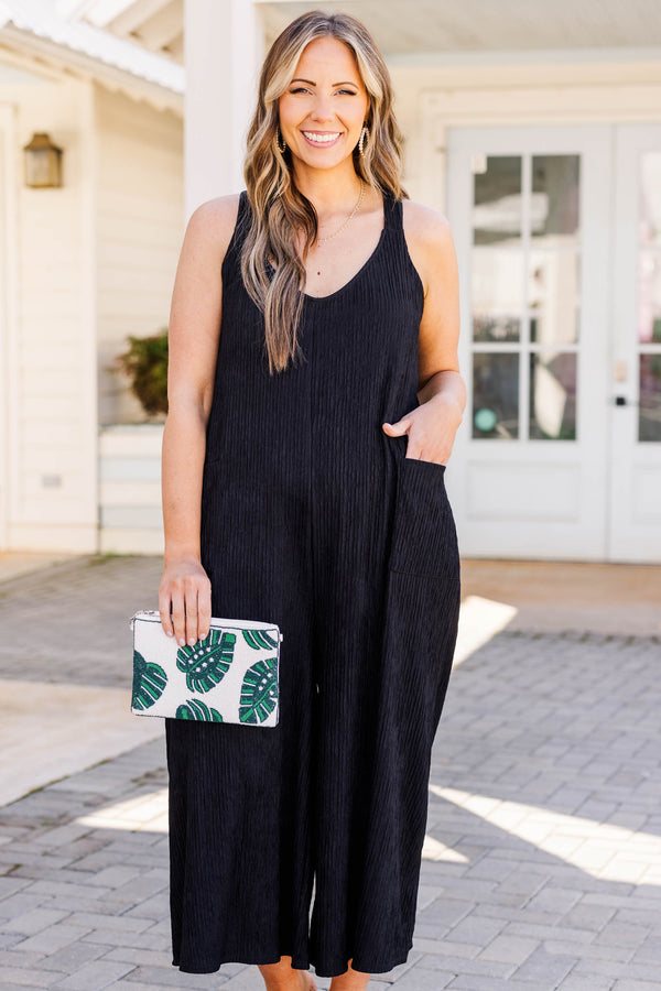 Chic Soul plus size clothing, black jumpsuit with front pockets and scoop neckline