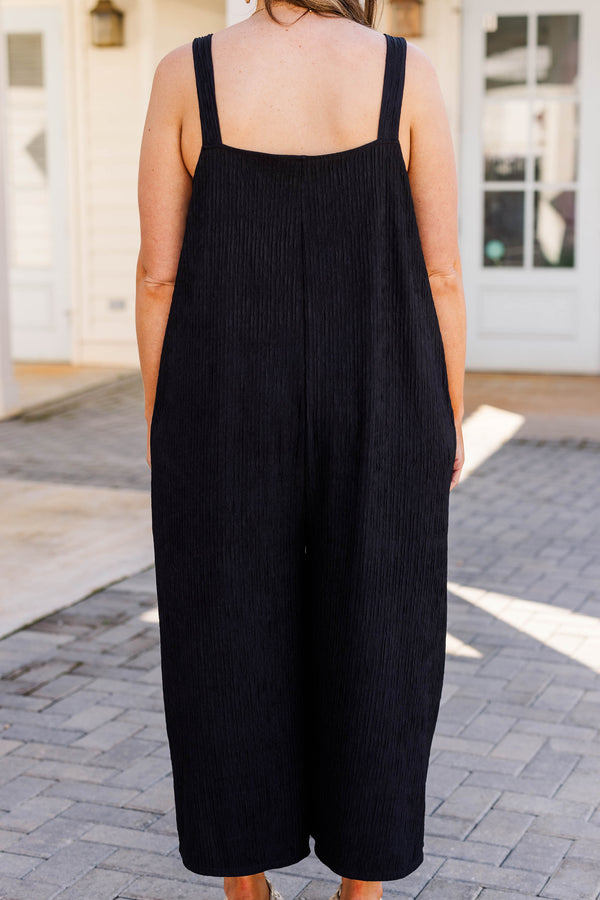 Chic Soul plus size clothing, black jumpsuit with front pockets and scoop neckline