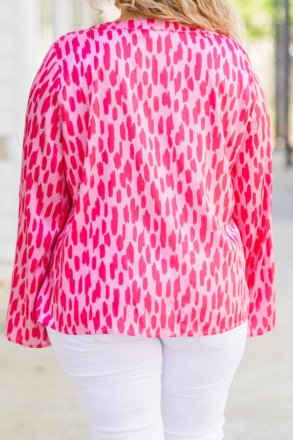 Chic Soul plus size clothing, long sleeve pink top with v-neckline and darker pink spotted pattern 