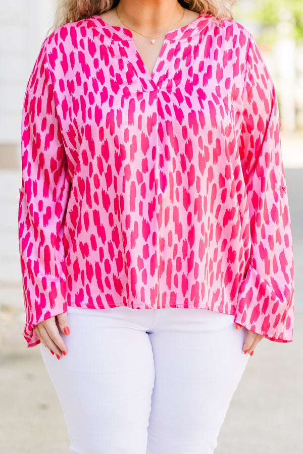 Chic Soul plus size clothing, long sleeve pink top with v-neckline and darker pink spotted pattern 