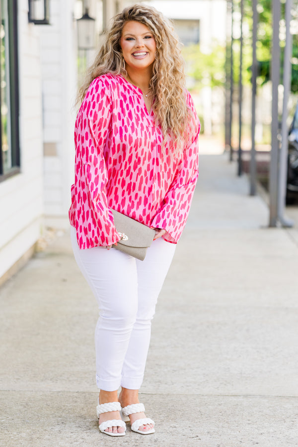Chic Soul plus size clothing, long sleeve pink top with v-neckline and darker pink spotted pattern 