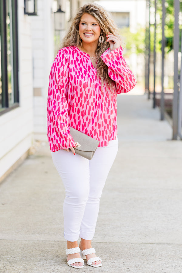 Chic Soul plus size clothing, long sleeve pink top with v-neckline and darker pink spotted pattern 