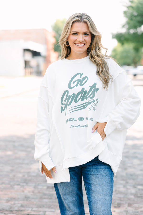 Plus Size ivory crew neck sweatshirt with a green Go Sports graphic and relaxed, oversized fit.
