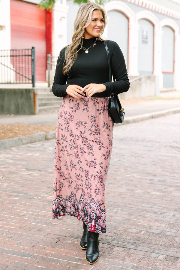 Plus Size pink floral maxi skirt with a bold border print hem and relaxed silhouette.