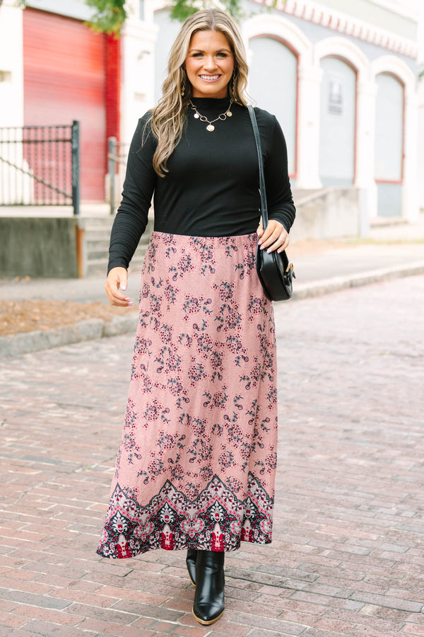 Plus Size pink floral maxi skirt with a bold border print hem and relaxed silhouette.