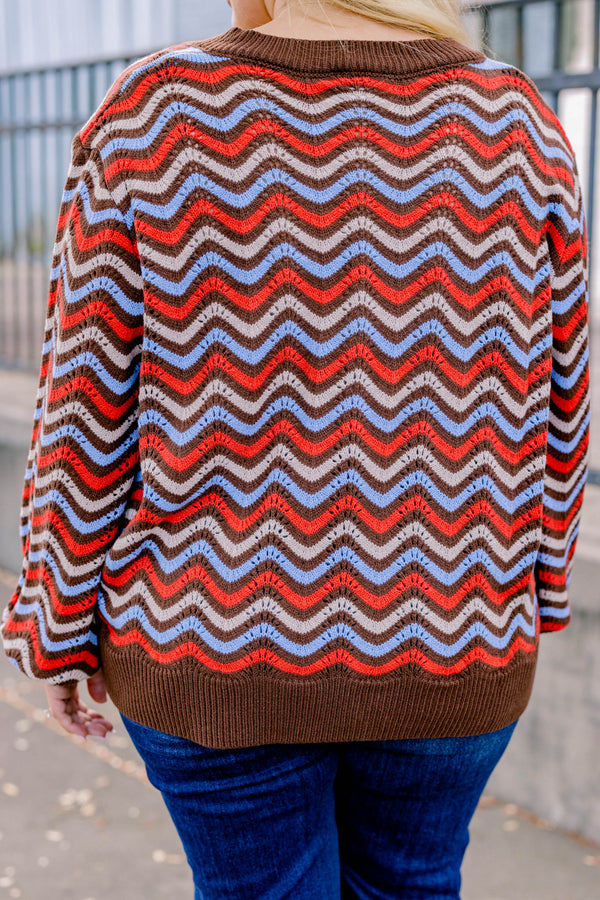Chic Soul plus size clothing, brown-multi long sleeve sweater with a brown red and blue wavy pattern  and a slight v-neckline