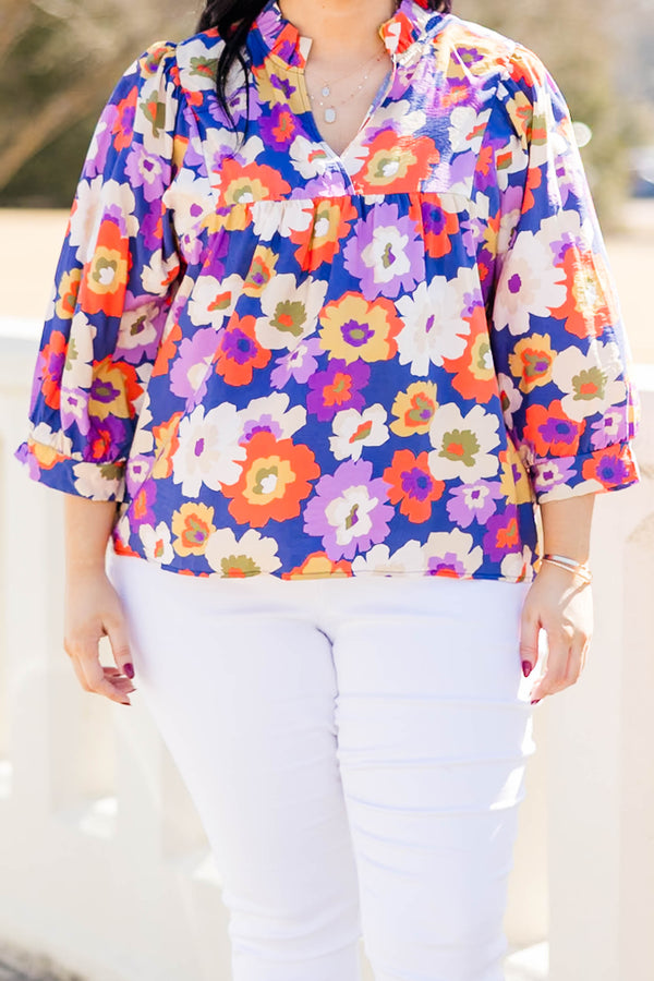 Chic Soul plus size clothing, three quarter length sleeve navy-purple top with cuff sleeves and v cutout along neckline with large multi floral print