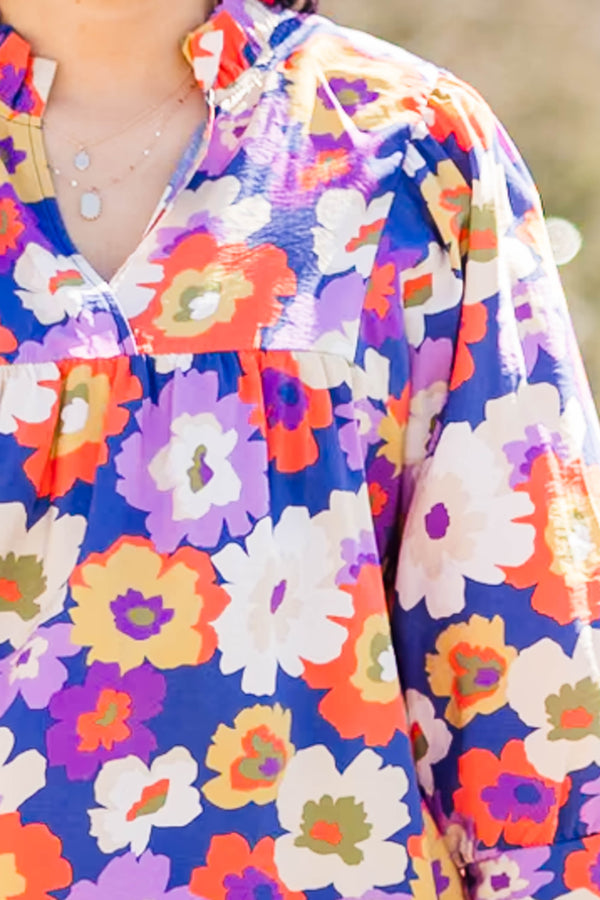 Chic Soul plus size clothing, three quarter length sleeve navy-purple top with cuff sleeves and v cutout along neckline with large multi floral print
