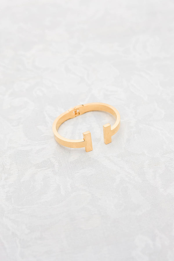 Chic Soul plus size clothing, gold open cuff bracelet with a horizontal gold bar on each side of the wrist 