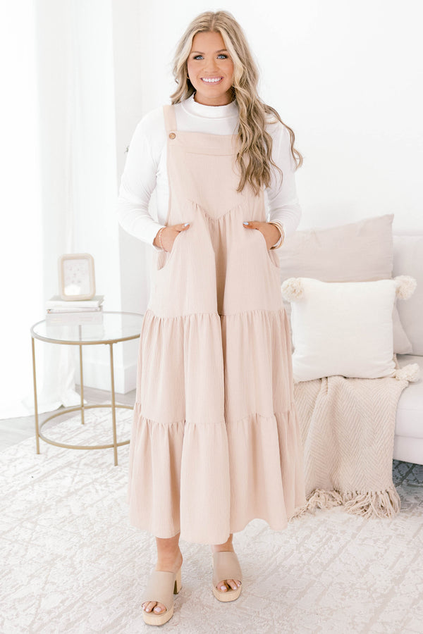Chic Soul plus size clothing, light tan sleeveless tiered maxi dress with buttons on the straps and a large front pocket on the chest