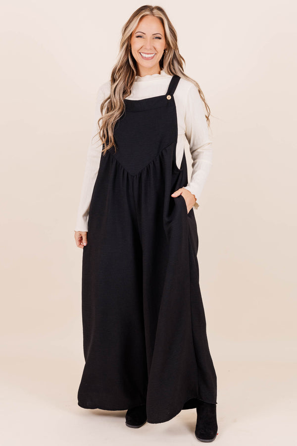 Chic Soul plus size clothing, black full length flowy jumpsuit with adjustable straps and triangle shape front seam detail