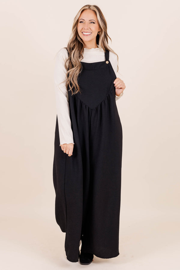 Chic Soul plus size clothing, black full length flowy jumpsuit with adjustable straps and triangle shape front seam detail