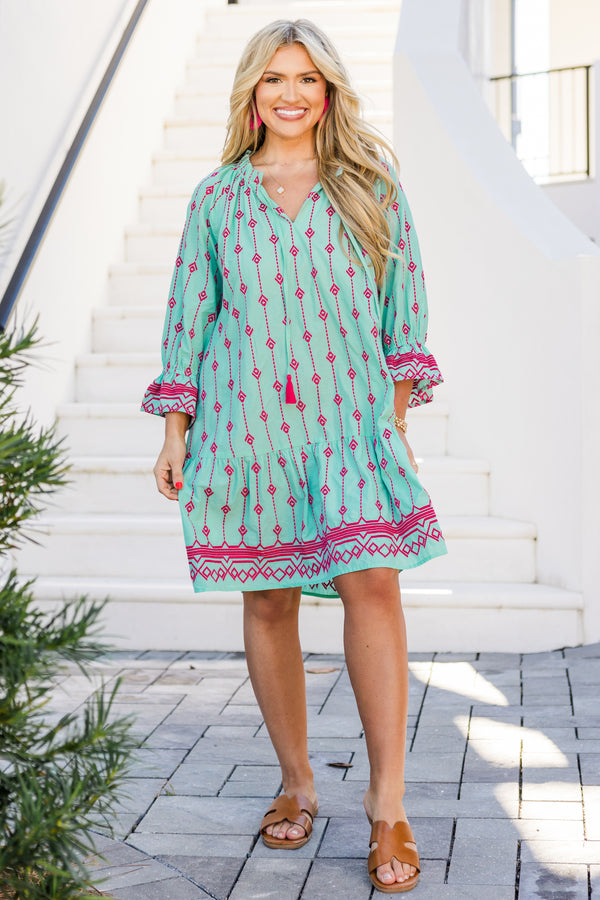 Plus Size teal cotton dress with pink Aztec embroidery, split V-neck, tassels, and flounce hem.