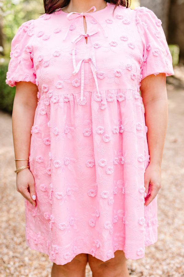 Chic Soul plus size clothing, pink short sleeve mini dress with raised floral detailing with three bow tie detail along chest with puff sleeves
