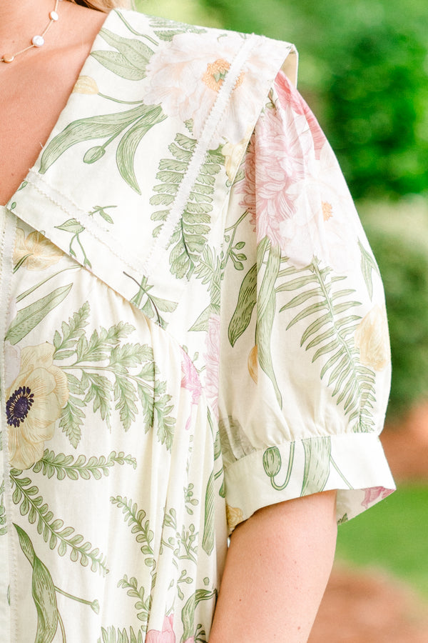 Plus Size sage floral mini dress with an oversized collar, gold flower buttons, and a drop waist.