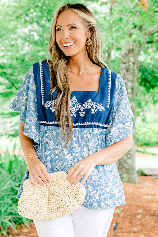 Chic Soul plus size clothing, baby blue short-flutter sleeve square neckline top with white floral pattern and solid navy blocking around shoulders with white embroidery