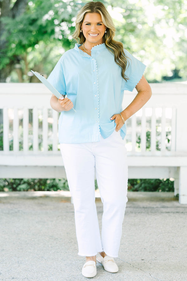 Plus size light blue button-front cotton blouse with scalloped trim on the neckline and sleeves.