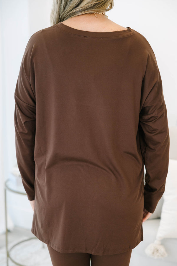 Plus Size chocolate brown lounge set with an oversized long sleeve v-neck top and matching leggings.