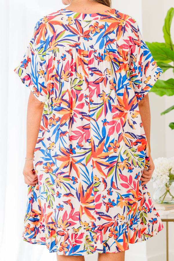 Chic Soul plus size clothing, short sleeve ivory dress with blue, orange, and yellow floral patterns and buttoned v-neckline